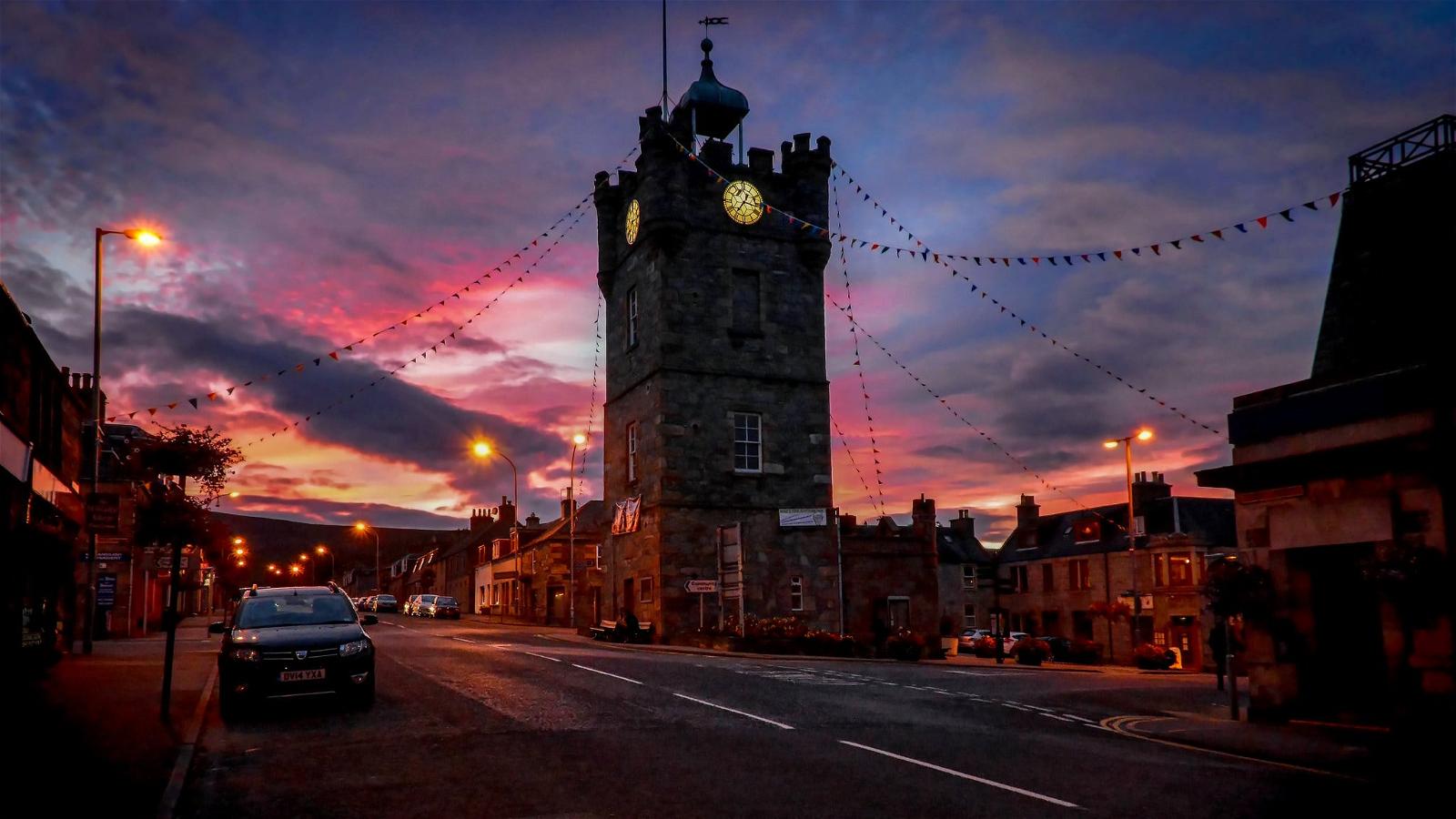 Bild av Clock Tower. sunset tower clock scotland moray dufftown