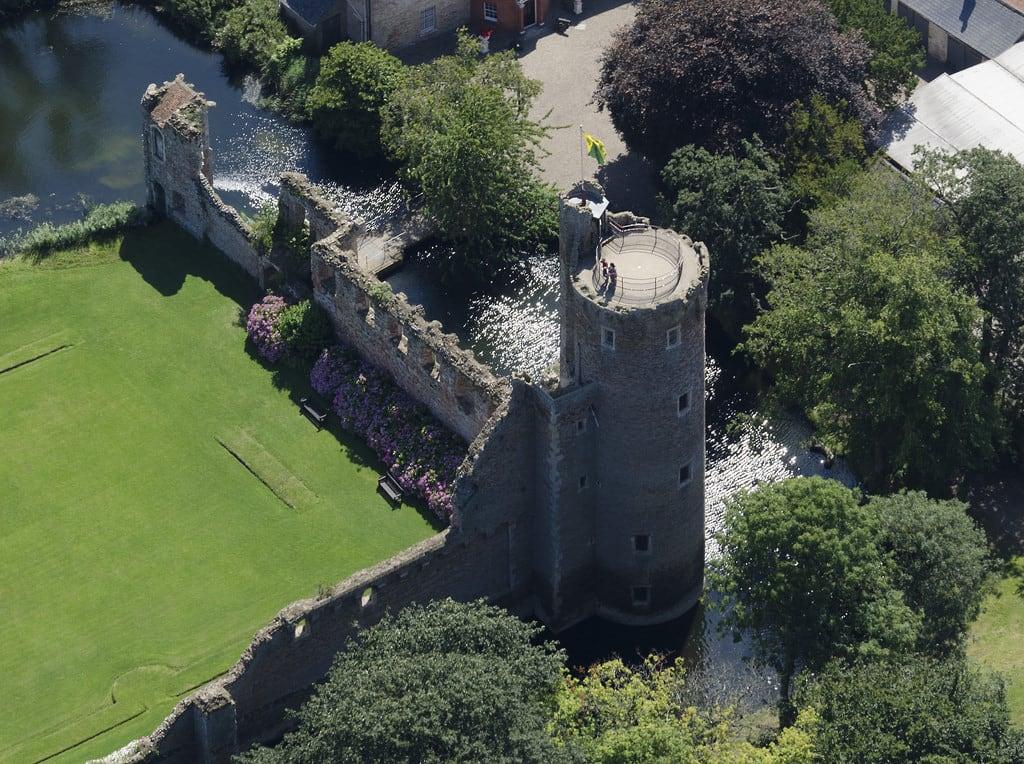 Caister Castle की छवि. castle fort norfolk aerial moat caister