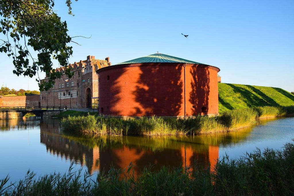 Image of Malmöhus slott. autumn sky castle water reflections europe sweden outdoor malmö renaissance höst slott malmöhus