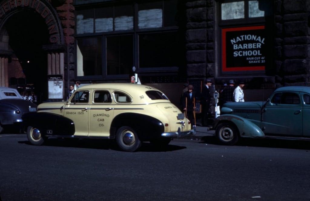 Image of Pioneer Building. seattlemunicipalarchives seattle taxis taxicabs pioneersquare vintagecars 1940s
