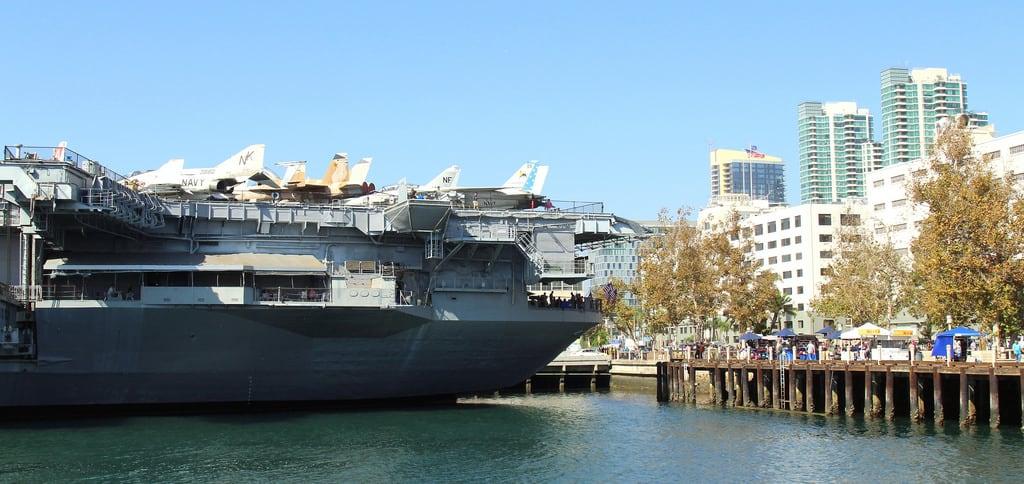 Image of USS Midway Museum. konomark uss united states ship air carrier kapal induk cv41 war midway museum sd san diego ca california sunny blue sky outdoor city skyline port dock water