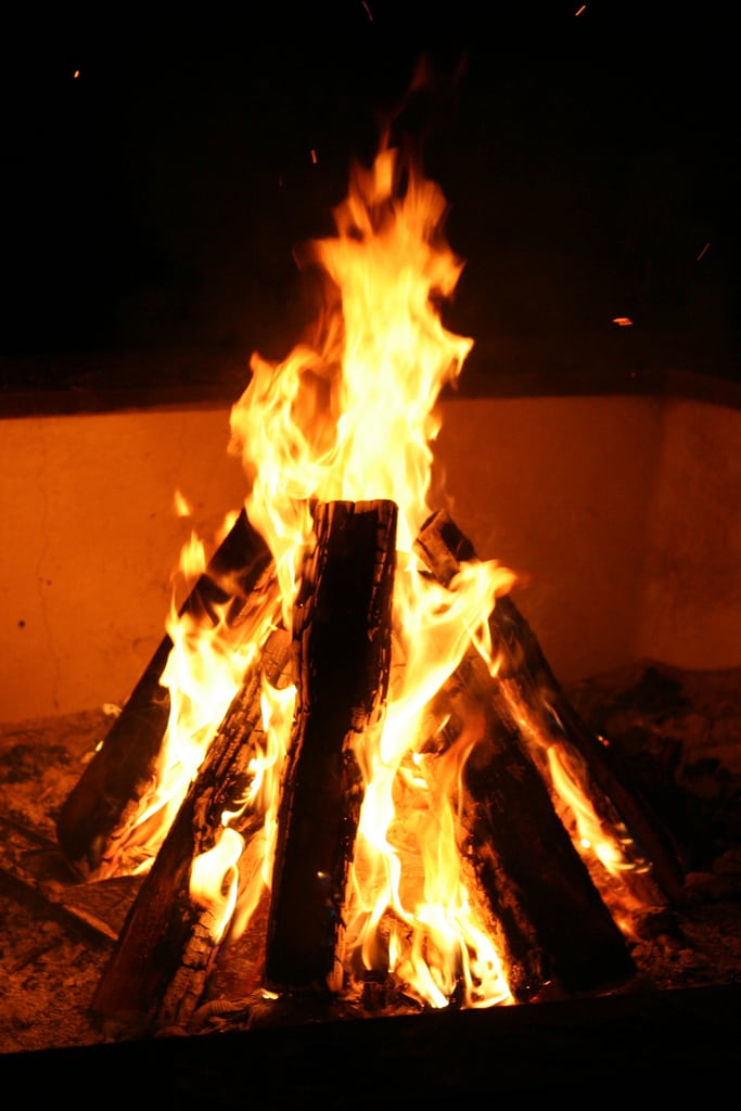 Image of Beach with a length of 1375 meters. camp beach fire flame teepee