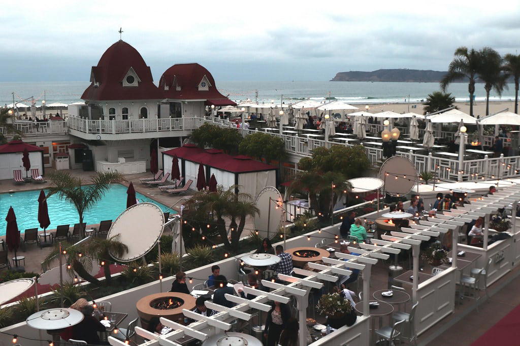 Image of Central Beach. hoteldel hotel del coronado island outdoor fun day cafe dining restaurant evening coast coastal beach water front pacific ocean cabrillo beautiful buenos noches fine casual san diego ca california life style swimming pool