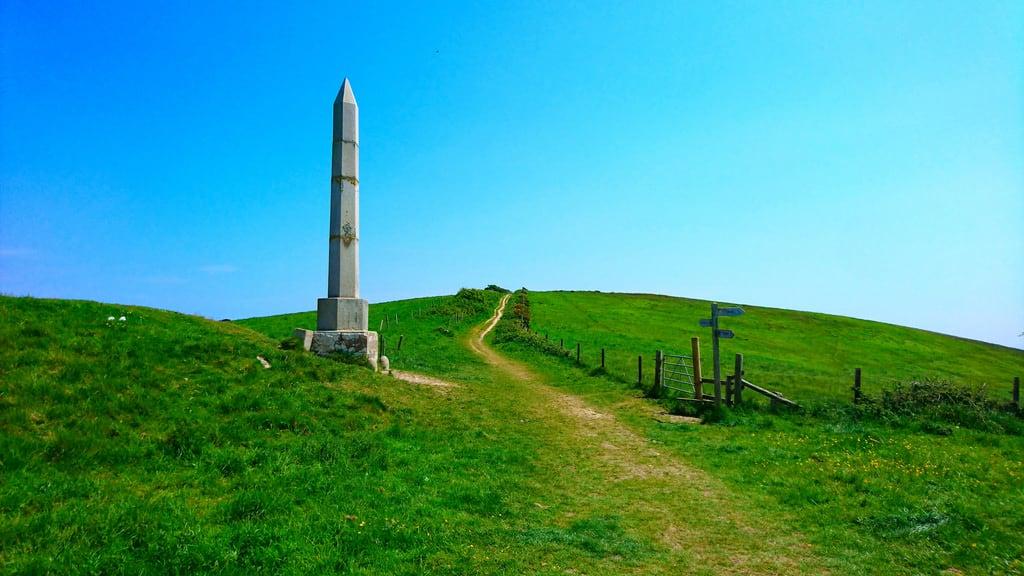 Attēls no Swanage Water Act Obelisk. the andy walker purbeck island studland circular walk hike ballard down swanage water act obelisk