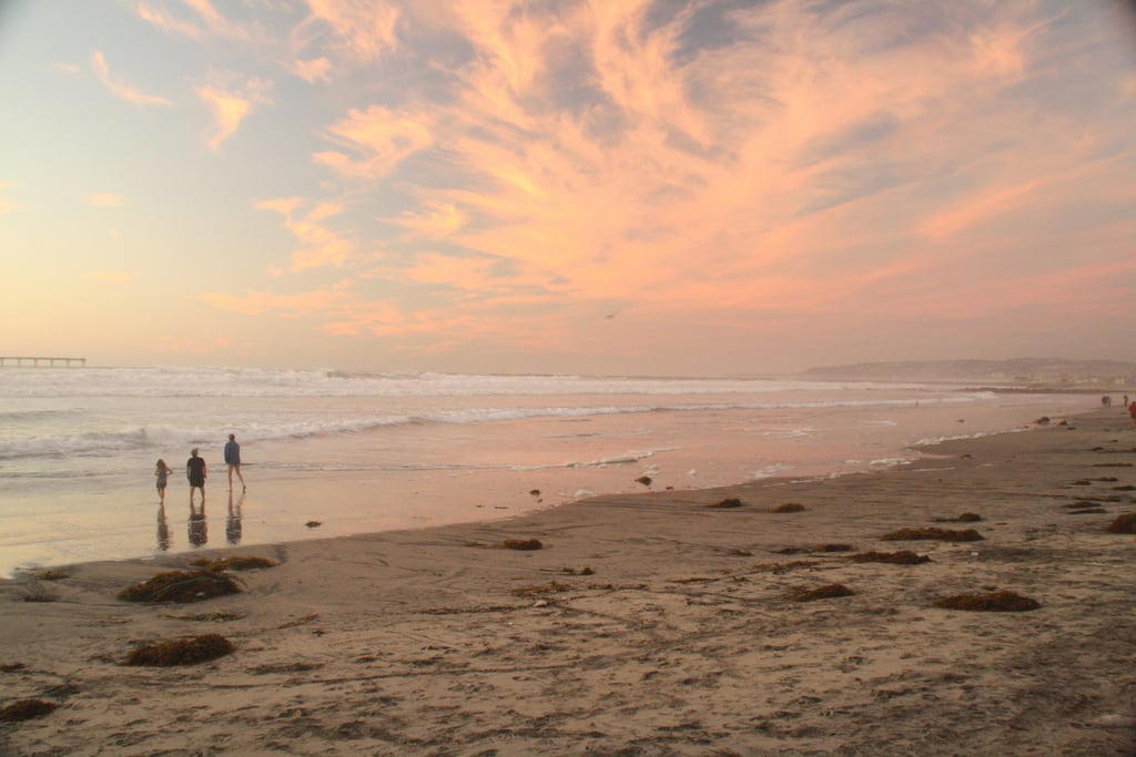 Image of Ocean Beach City Beach. ob ca oceanbeach sandiego pacific beach shore california ocean sundown sunset orange water sand