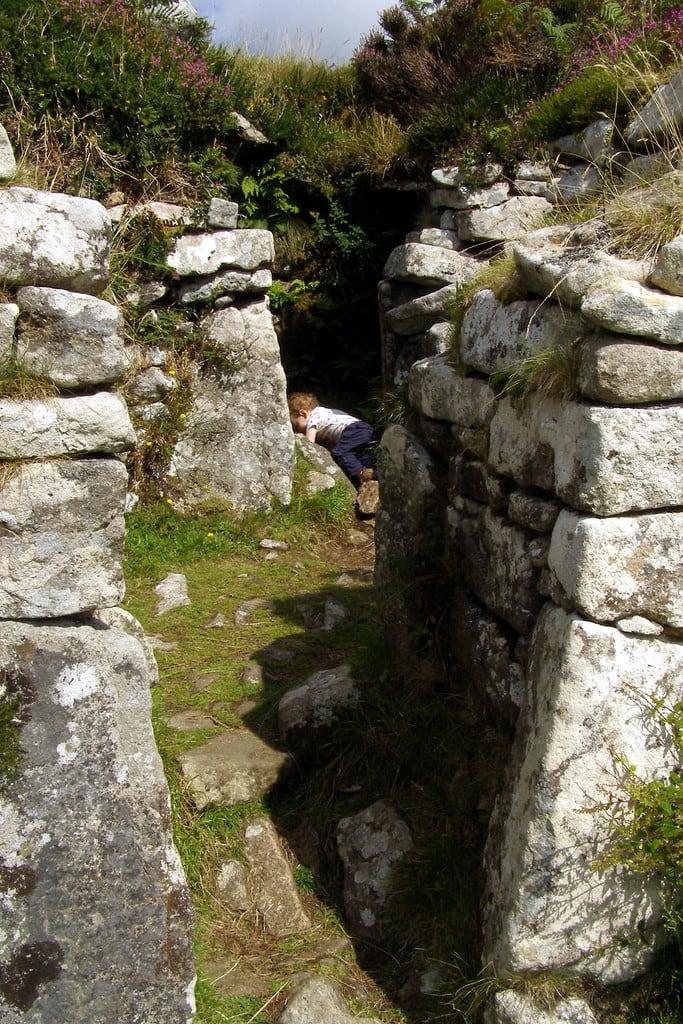 Immagine di Chysauster Ancient Village. old boy summer holiday cornwall child ruin son granite finn settlement ironage englishheritage chysauster courtyardhouse finnjameschampion