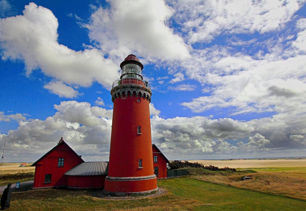 Image of Bovbjerg Fyr. red summer sky lighthouse holiday classic weather architecture clouds germany landscape europe postcard wideangle bluegreen bovbjerg